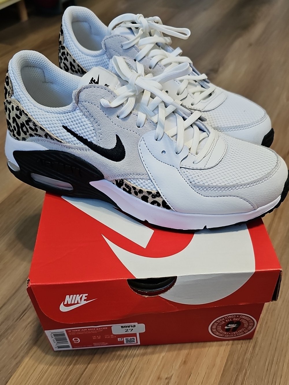 Nike White and Black Leopard Accent Running Sneakers